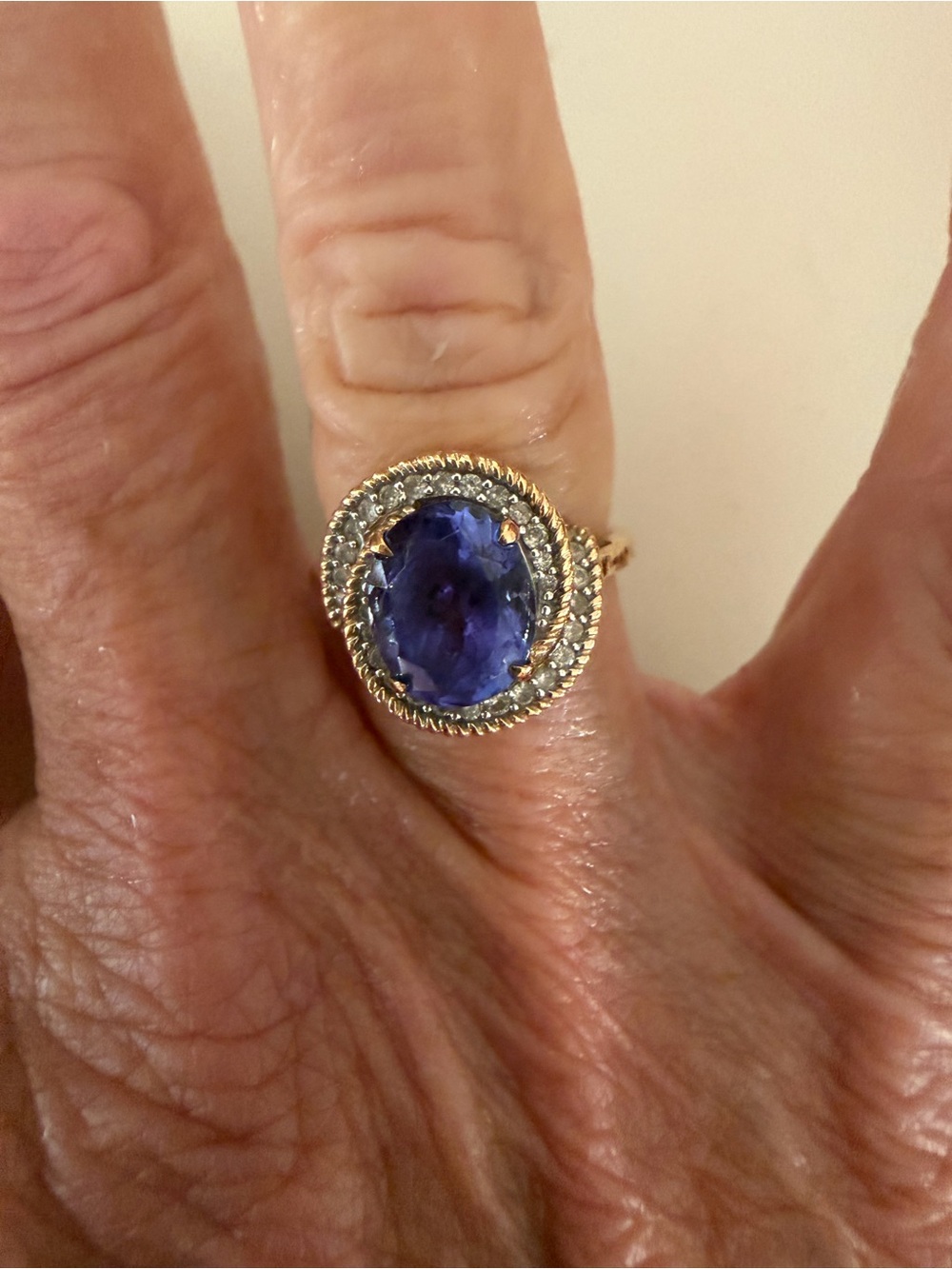 Gold Ring with Deep Blue Oval Gemstone
